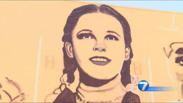 Centerville native paints mural on Miamisburg theater building for reopening