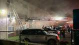 Fire rips through large apartment building, dozens displaced 