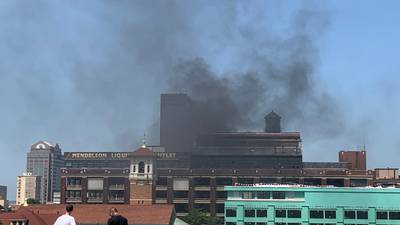 PHOTOS: Firefighters battle fire at former Mendelson's building in Dayton