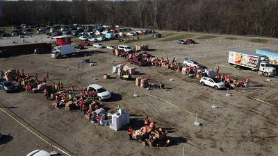 PHOTOS: Mass food distribution held in North Dayton