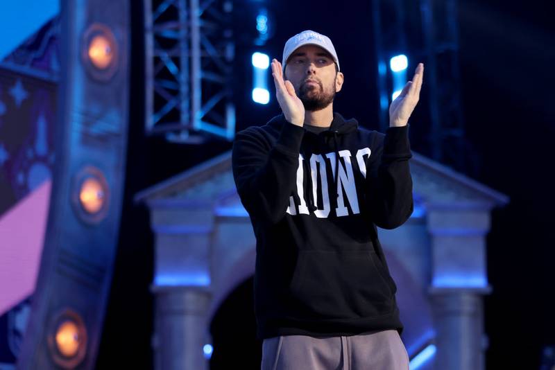 DETROIT, MICHIGAN - APRIL 25: Rapper Marshall "Eminem" Mathers claps during the first round of the 2024 NFL Draft at Campus Martius Park and Hart Plaza on April 25, 2024 in Detroit, Michigan. (Photo by Gregory Shamus/Getty Images)