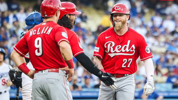 Reds get 2 home runs to beat Dodgers, trail Brewers by half-game in NL Central