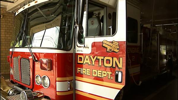 Firefighters, officers respond to house fire in Dayton