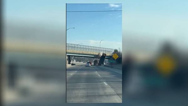 WATCH: Dump truck slams into overpass in Dayton 