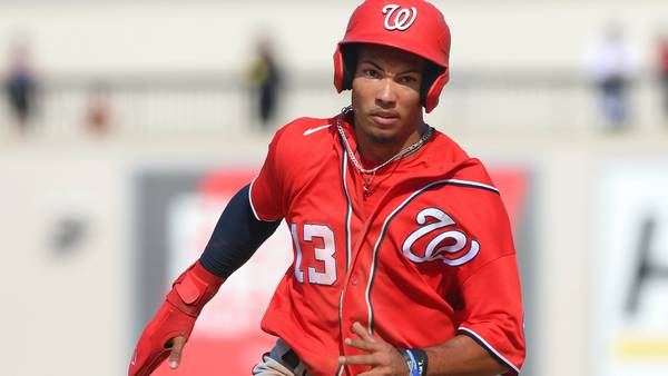 Nationals prospect Daylen Lile stretchered off after flipping into bullpen headfirst in attempt to catch homer