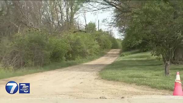 Witness reports human legs found in trash bags outside Trotwood home; Crime lab investigating