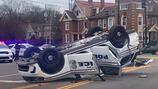 Police cruiser lands on top after crash in Dayton 