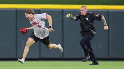 ‘Great catch,’ Reds legend praises officer for catching fan on field