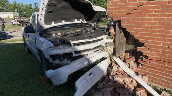 PHOTOS: Car crashes into house in Brookville; 1 injured 