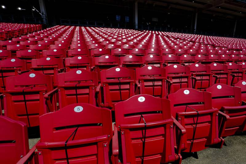 A view of seats with zip ties for social distancing fans is seen during a baseball team workout in Cincinnati, Wednesday, March 31, 2021. The Cardinals play in an opening day game at the Cincinnati Reds on Thursday. (AP Photo/Aaron Doster)