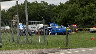 PHOTOS: CareFlight makes ‘hard landing’ after responding to deadly vehicle crash in Butler County