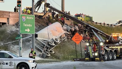 PHOTOS: Semi-truck overturns on I-75 in Dayton