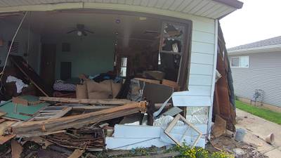 PHOTOS: Springfield home sustains significant damage after driver crashes into house Wednesday