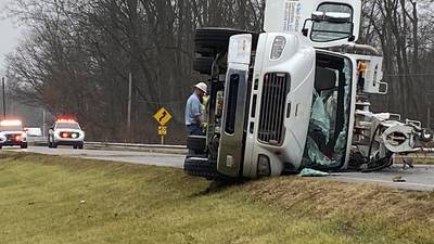 PHOTOS: Rollover crash in Preble County traps victim inside utility truck