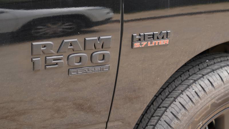 Dodge ram 1500 hemi 5.7 liter truck logo sign and brand text on side suv car door