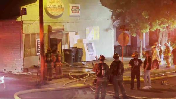 Crews respond to business fire in Dayton
