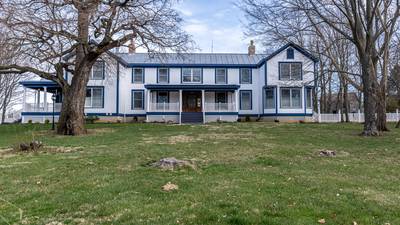 PHOTOS: Estate with 8 acres, full-size vault and log structure on market for $3.5M