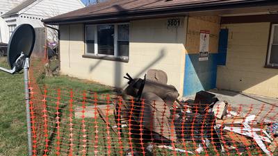 PHOTOS; Family displaced after car slams into Harrison Twp. home