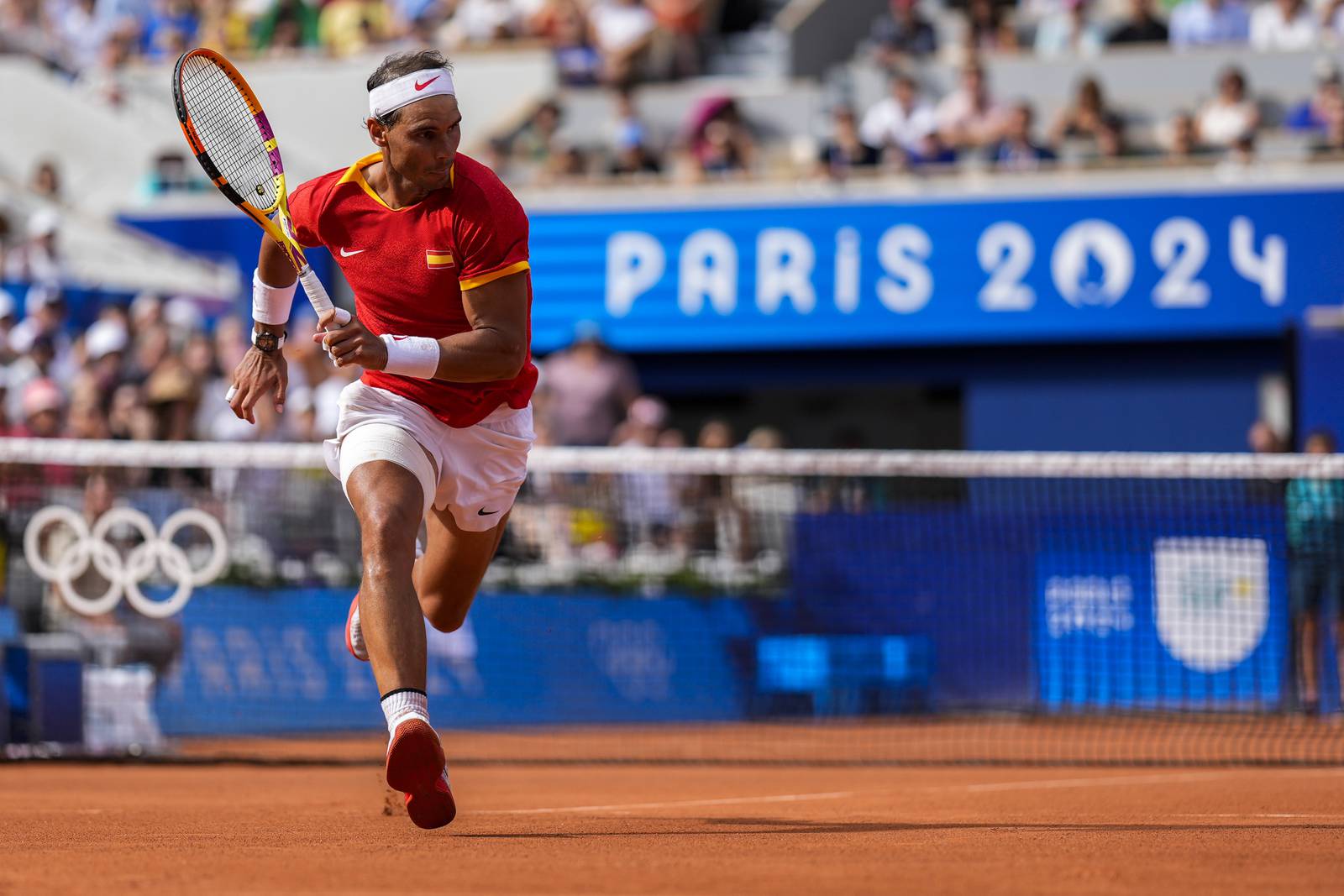 Rafael Nadal wins in Olympic singles and will play rival Novak Djokovic