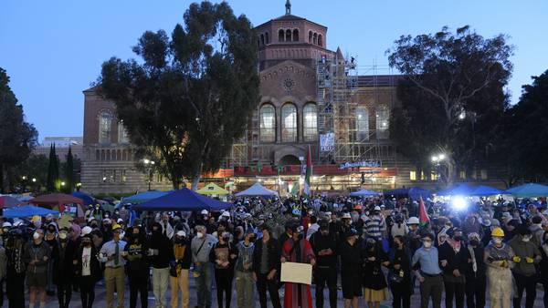 Police begin removing barricades at a pro-Palestinian demonstrators' encampment at UCLA