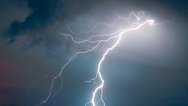 Lightning hits ground near worker in area of Indiana city pool and fairgrounds