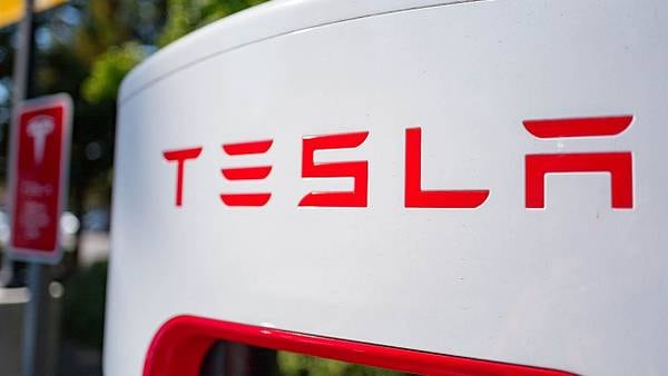 Tesla shares plummet after company reports falling profits