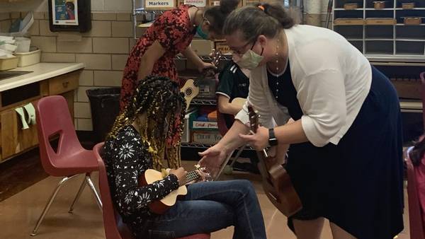 Teacher’s passion helps bring ukulele music into Troy schools