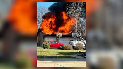 PHOTOS: Garage catches fire in Miami County