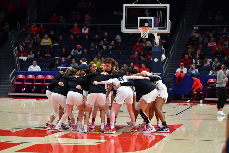 Photo of UD Women's Basketball Huddle from URI. Photo courtesy of Rick Roshto