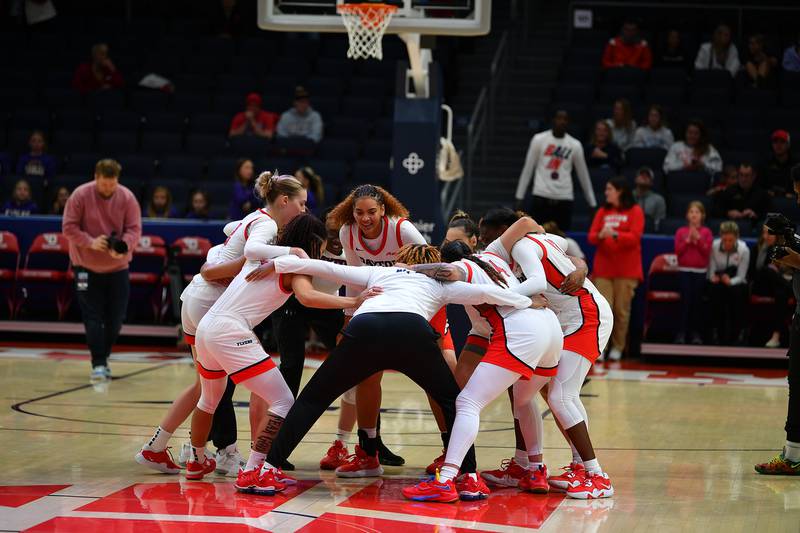 Photo of UD Women's Basketball Huddle from URI. Photo courtesy of Rick Roshto