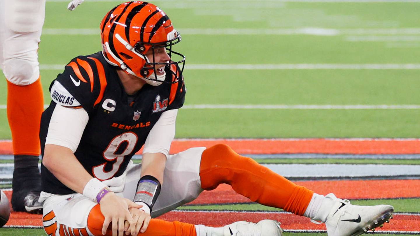 Joe Burrow injury: Bengals quarterback carted off after hit to knee