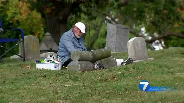 Making a Difference: Man cleans and cares for headstones at Woodland Cemetery