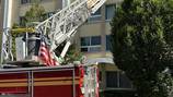 Firefighters battle high-rise apartment fire in Dayton