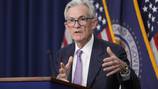 Federal Reserve cuts key rate by sizable half-point, signaling end to its inflation fight