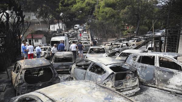 5 ex-officials were convicted over Greece's deadliest fire but freed after paying fines