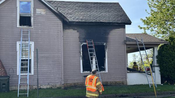 Mother, child injured after jumping from window in Troy house fire