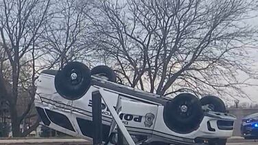 Police cruiser lands on top after crash in Dayton 