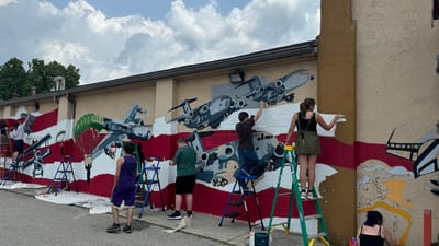 PHOTOS: Teens on probation paint mural in downtown Fairborn