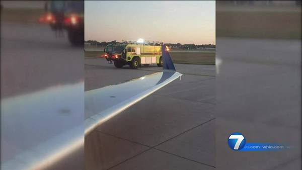 Plane slid off runway, hit sign at Dayton International Airport