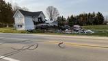 House considered ‘total loss’ after semi crash in Miami County; 2 hospitalized
