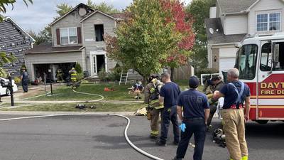 PHOTOS: 2 homes damaged in fire on Wellington Place in Dayton Thursday