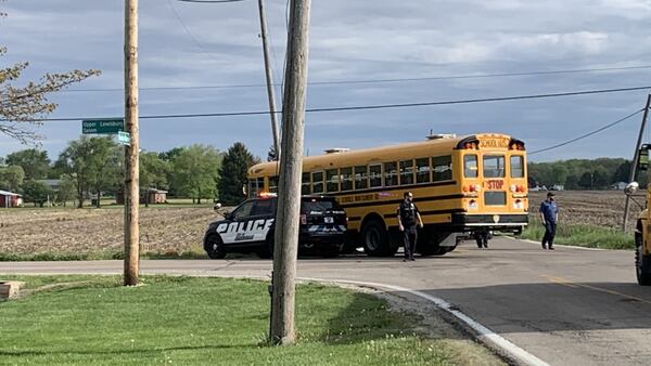 PHOTOS: Police respond to crash involving school bus in Clay Twp. 