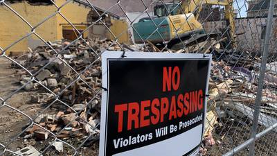 PHOTOS: Troy property owner starts demo without city approval