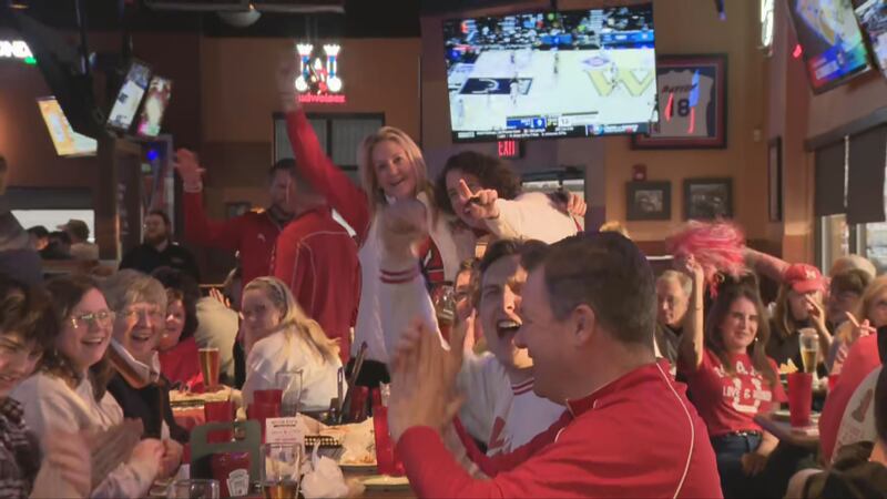 RedHawks fans pack local bars to cheer on team in First Four