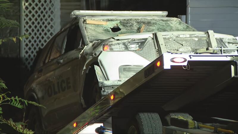 UPDATE: Multiple injuries reported after stolen police cruiser crashes into home in Dayton