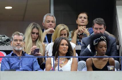 NEW YORK, NY - SEPTEMBER 08: Actor Pierce Brosnan and singer Vanessa Williams look on during the Women's Singles finals match between Serena Williams of the United States and Naomi Osaka of Japan on Day Thirteen of the 2018 US Open at the USTA Billie Jean King National Tennis Center on September 8, 2018 in the Flushing neighborhood of the Queens borough of New York City. (Photo by Elsa/Getty Images)