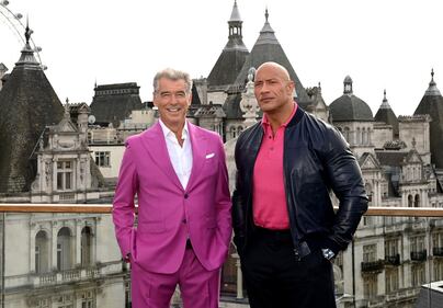 LONDON, ENGLAND - OCTOBER 17: Pierce Brosnan and Dwayne Johnson aka The Rock attend the "Black Adam" photocall at The Corinthia Hotel on October 17, 2022 in London, England. (Photo by Kate Green/Getty Images for Warner Bros.)