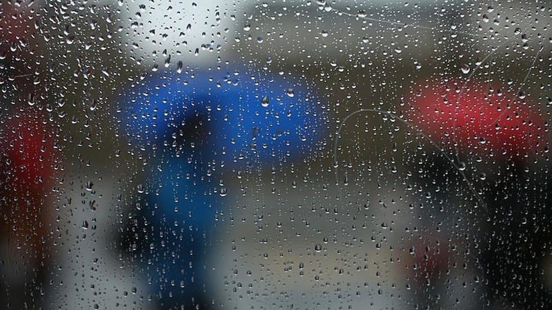 Rain and snow move in