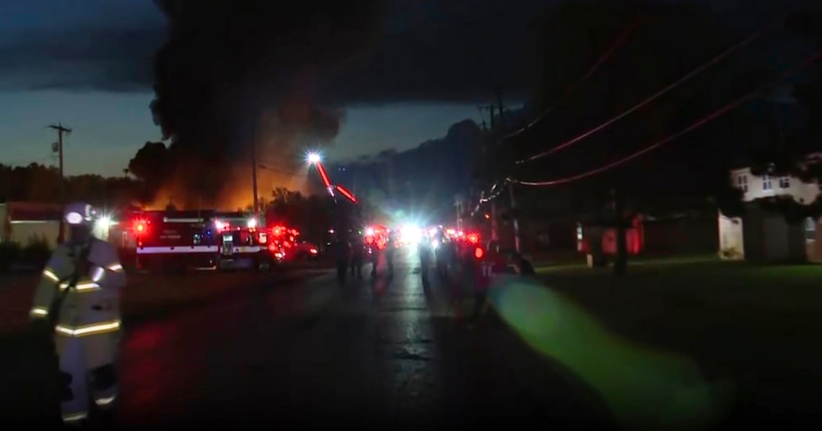 Ohio firefighters responding to explosions and a fire at Toledo industrial recycling business