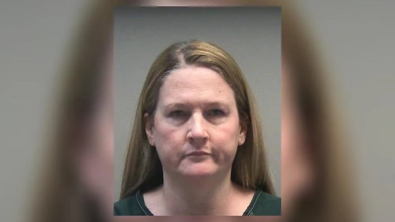Medical practice business manager accused of stealing over $834K turns herself in